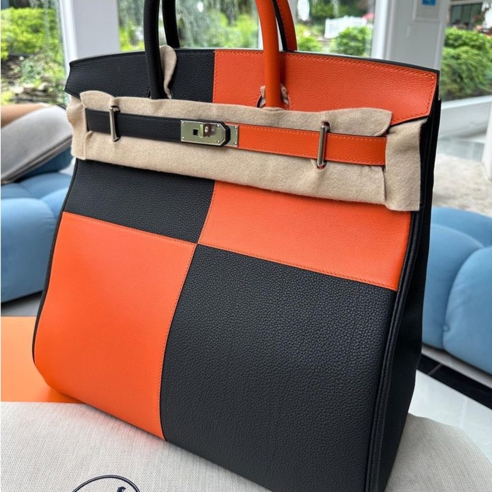 Hermès Haut à Courroies Casaque bag in Togo calfskin and Evercolor calfskin.